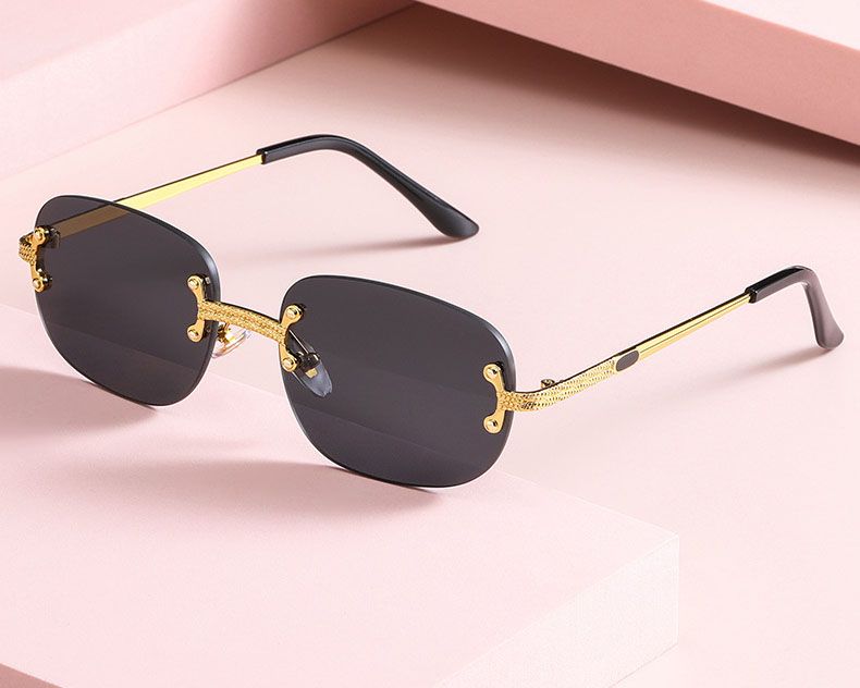  Rimless oval lens embossed pattern metal legs sunglasses
