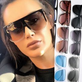 Glossy oversized frame playful flair flat top sunglasses